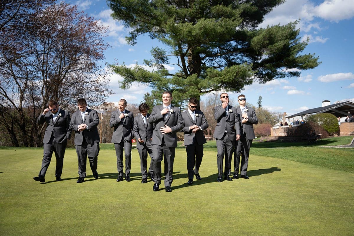 Groomsmen lined up on the lawn at The Club at Picatinny