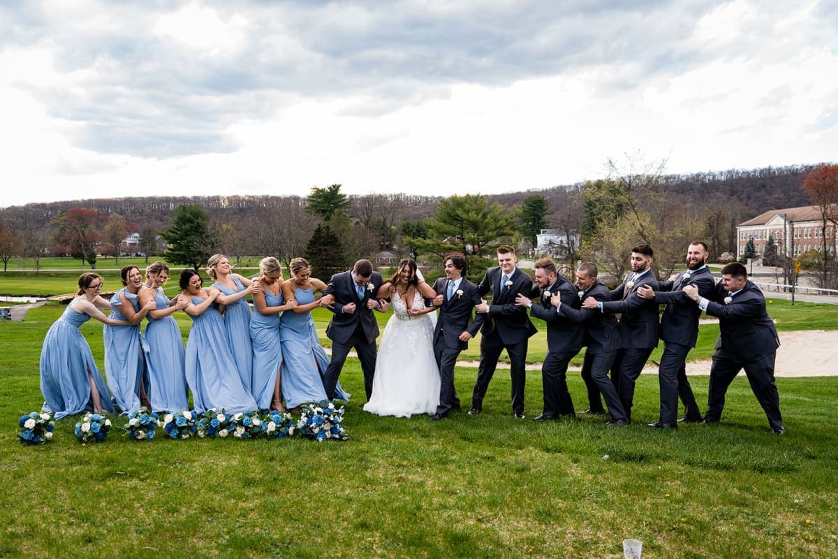 The full wedding party on the lawn at The Club at Picatinny