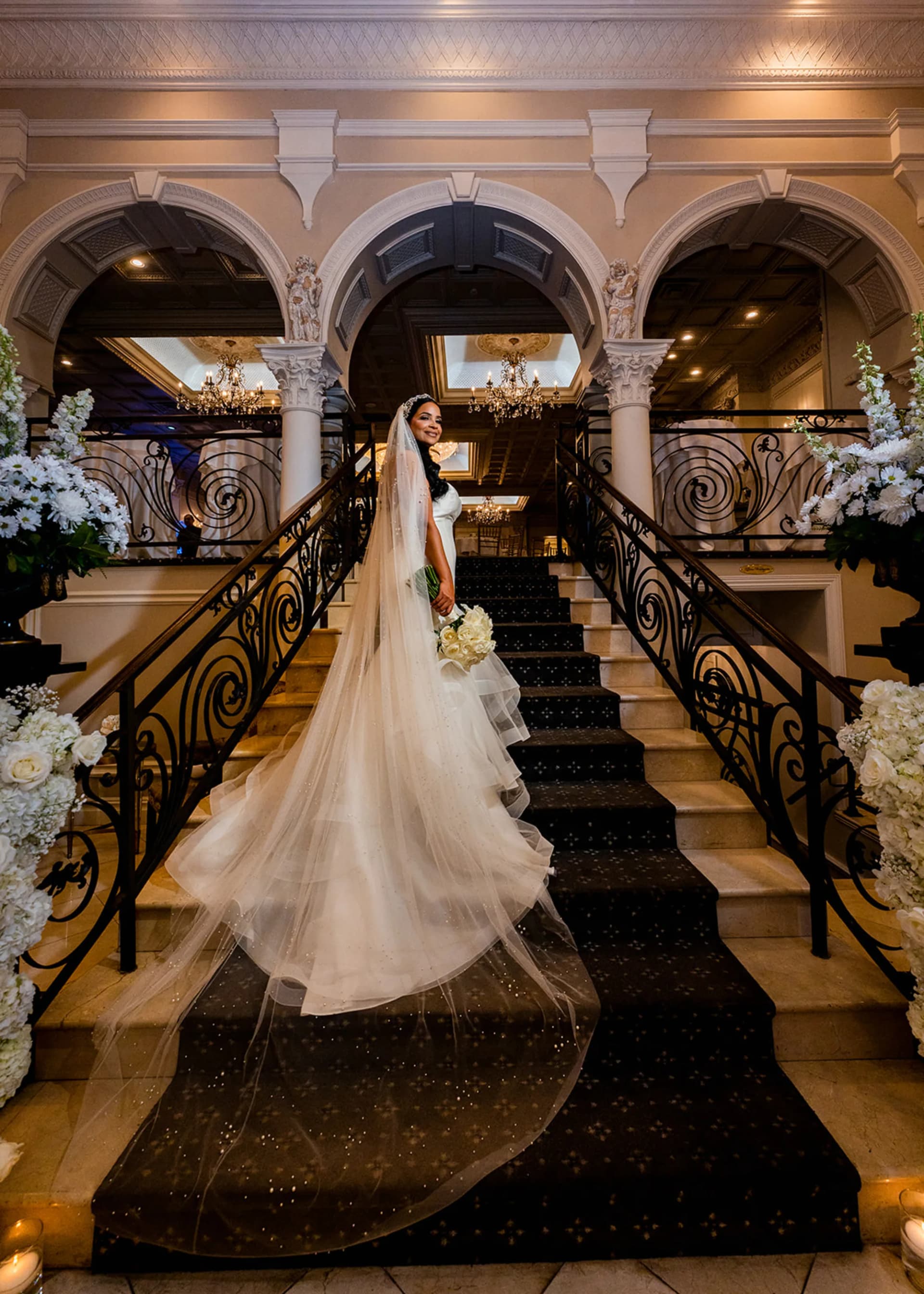 Judy on the grand staircase at Nanina's In the Park, Belleville, NJ