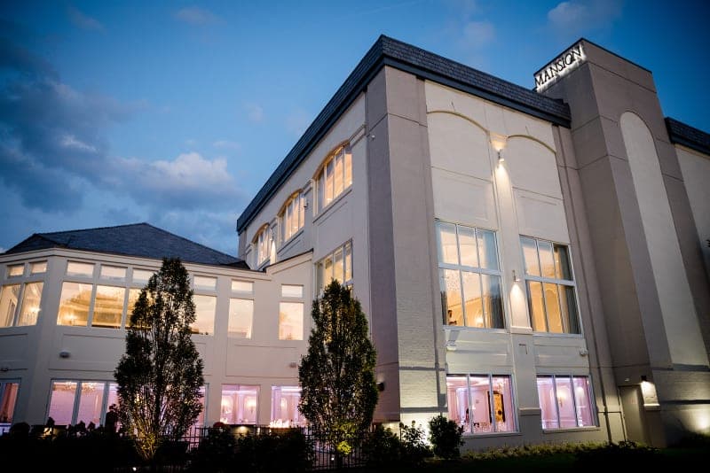Bride and groom sunset portrait