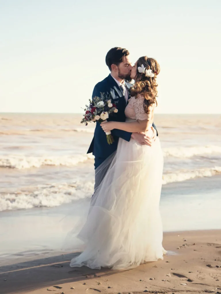 Newlyweds on beach